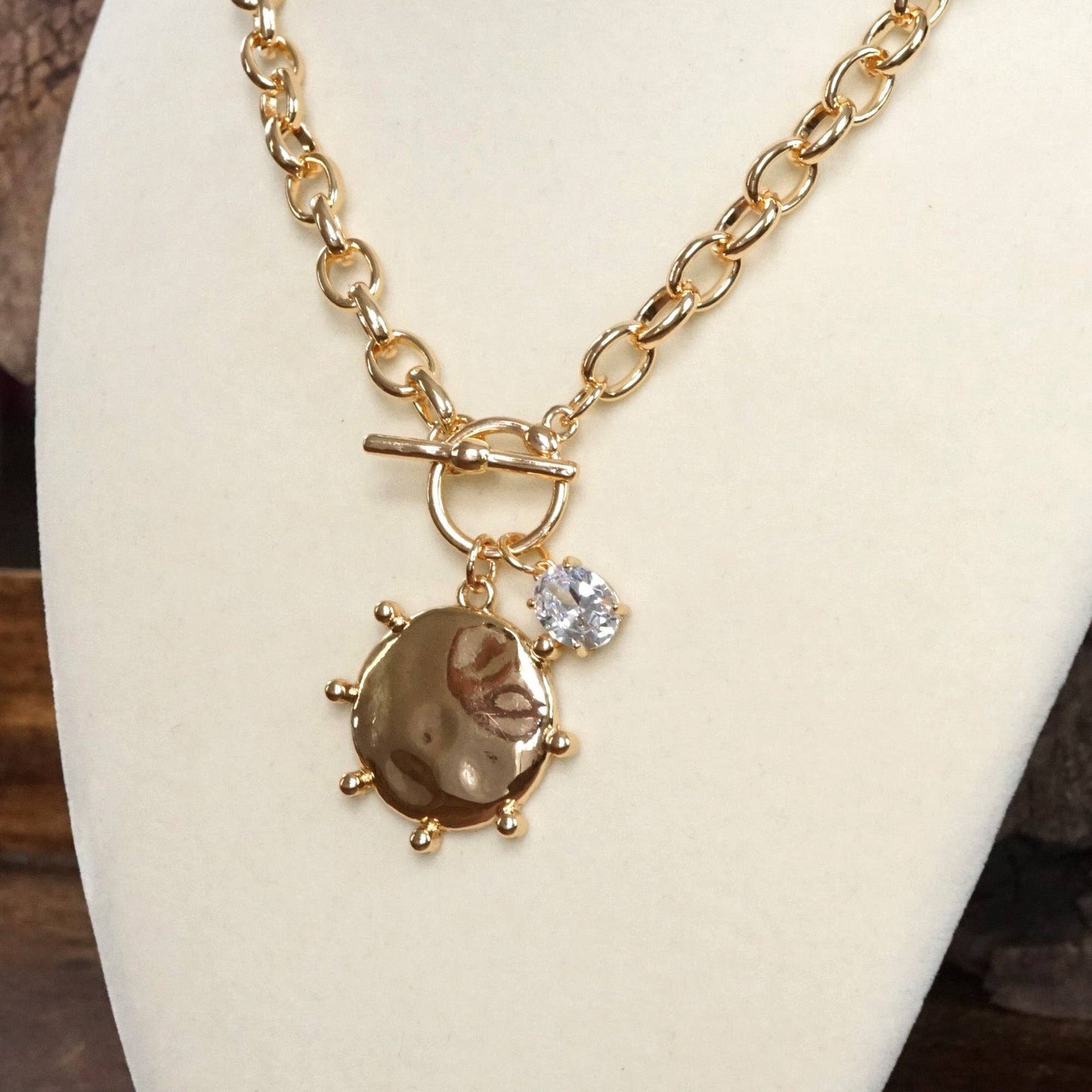 Front Toggle Hammered Coin & Crystal Charm Necklace – Gold Tone