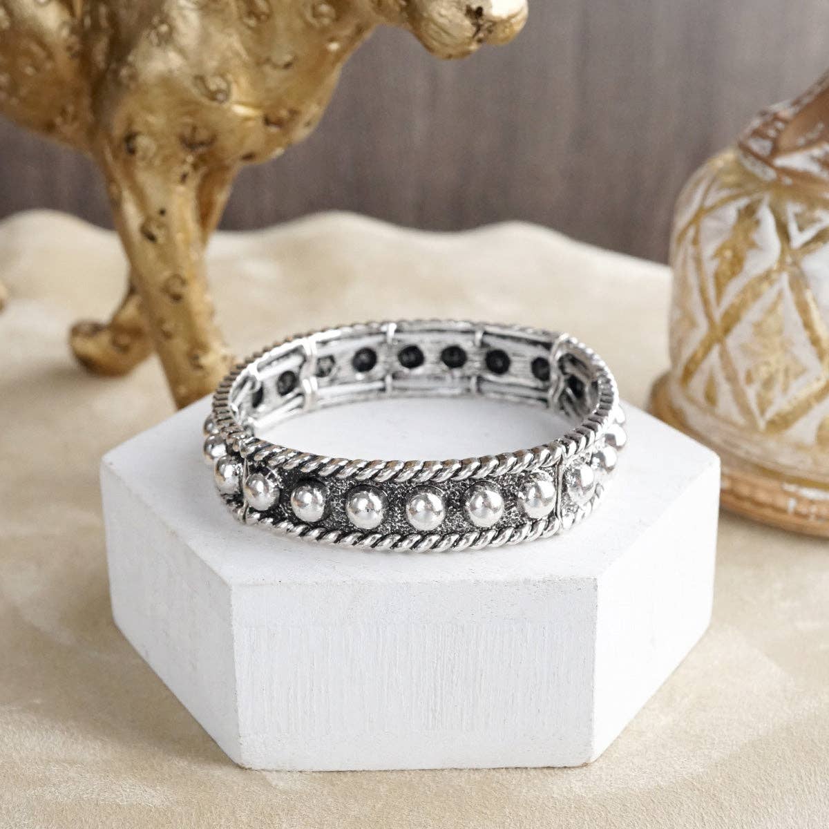 Western Whimsy – Worn Silver Tone Bubble Stretchy Bangle