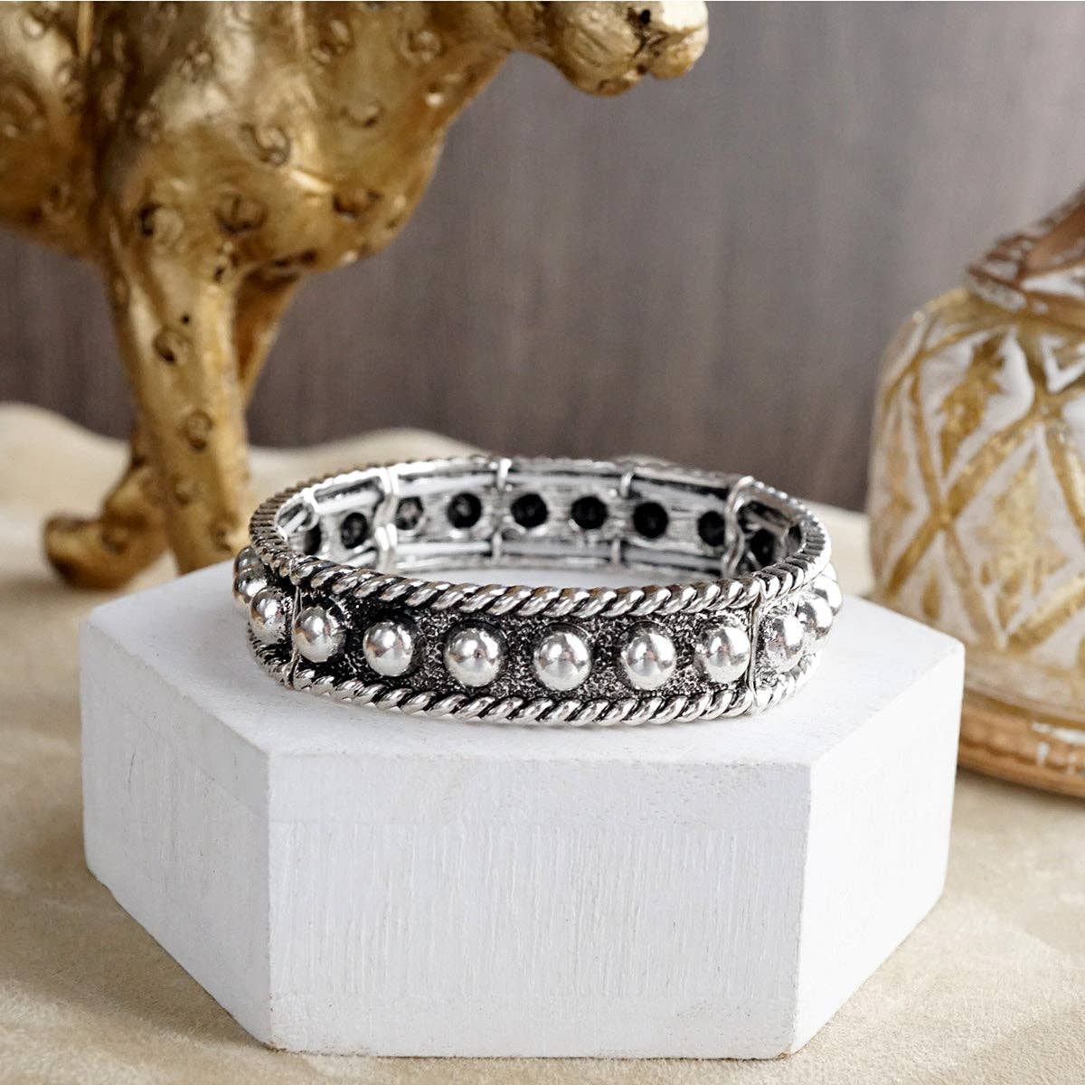 Western Whimsy – Worn Silver Tone Bubble Stretchy Bangle