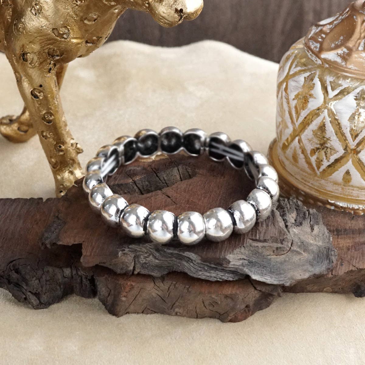 Western Whimsy – Worn Silver Tone Bubble Stretchy Bangle